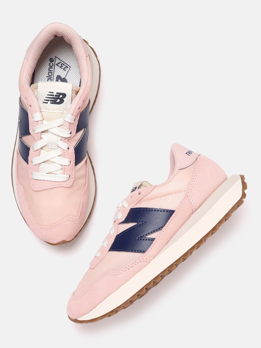 

New Balance Women Pink Solid Suede Sneakers