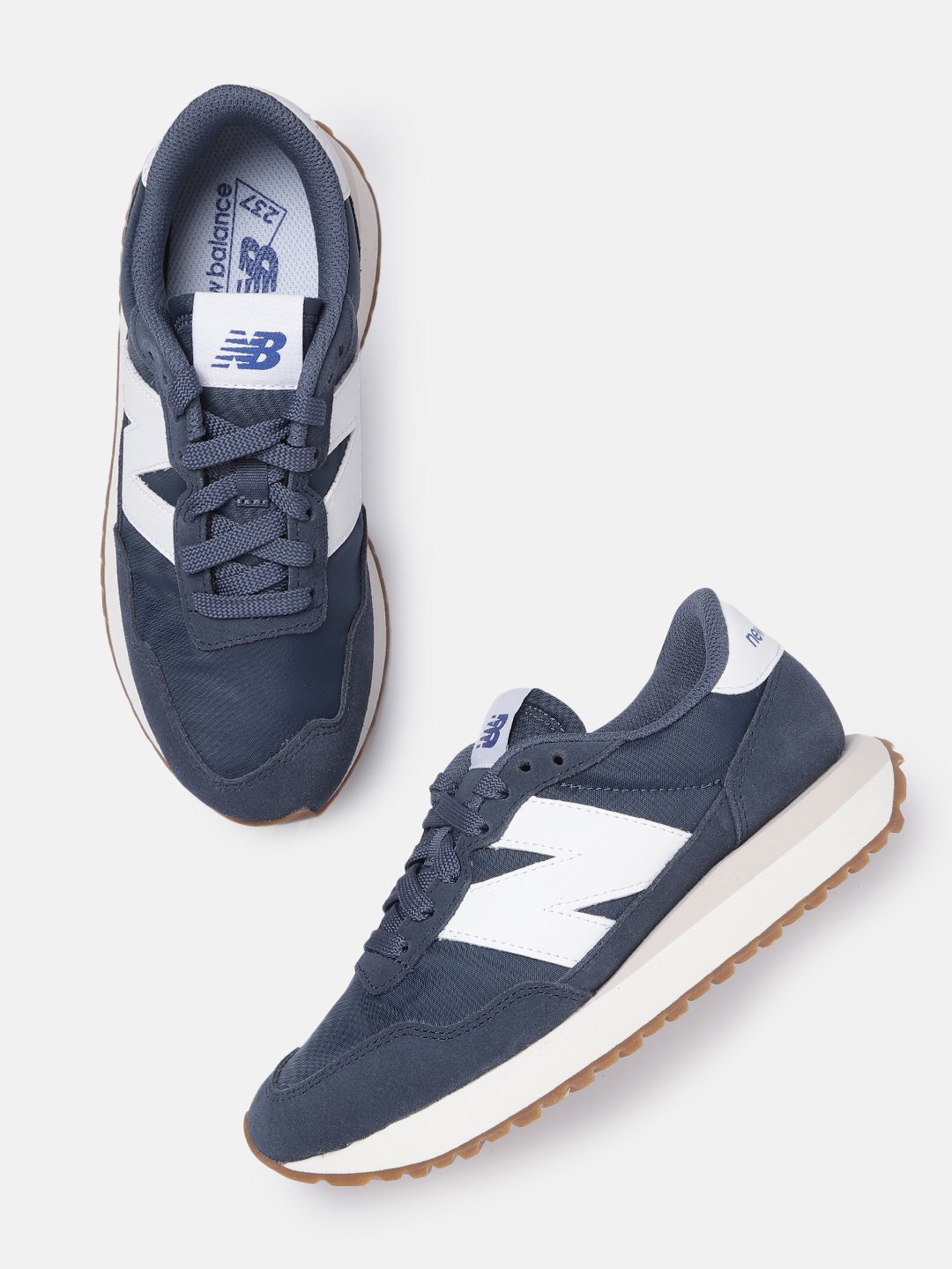

New Balance Men Navy Blue & White Woven Design Sneakers