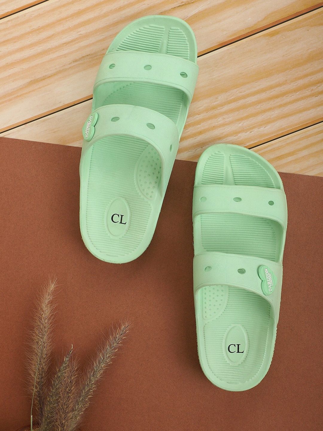 

Carlton London Women Green Solid Sliders