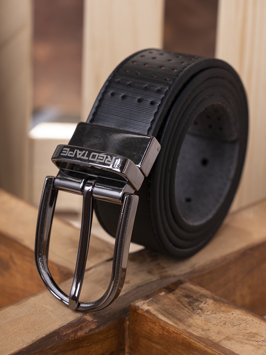 

Red Tape Men Black Textured Leather Reversible Belt