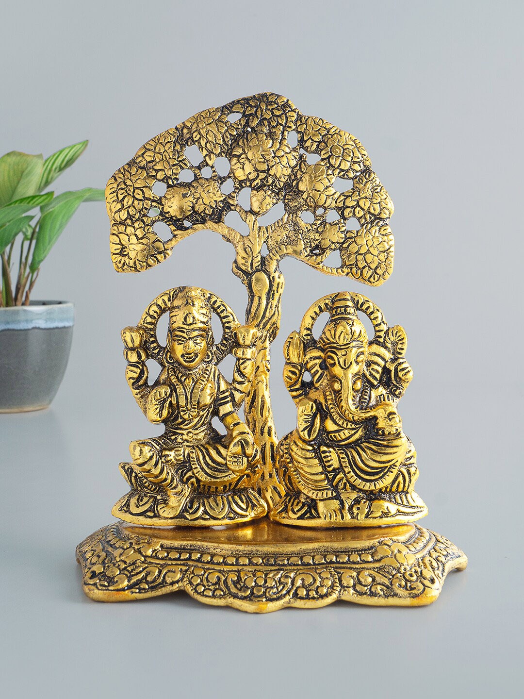 

Golden Peacock Gold-Toned Ganesha Laxmi Showpiece