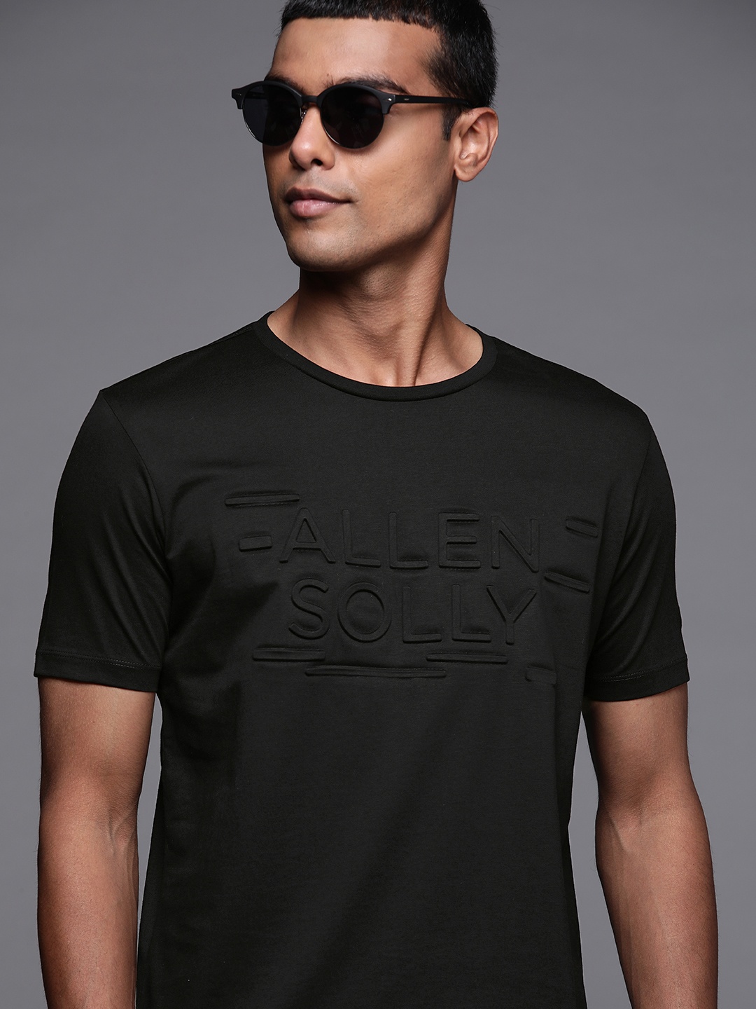 

Allen Solly Men Black Pure Cotton Brand Logo Embossed Printed T-shirt
