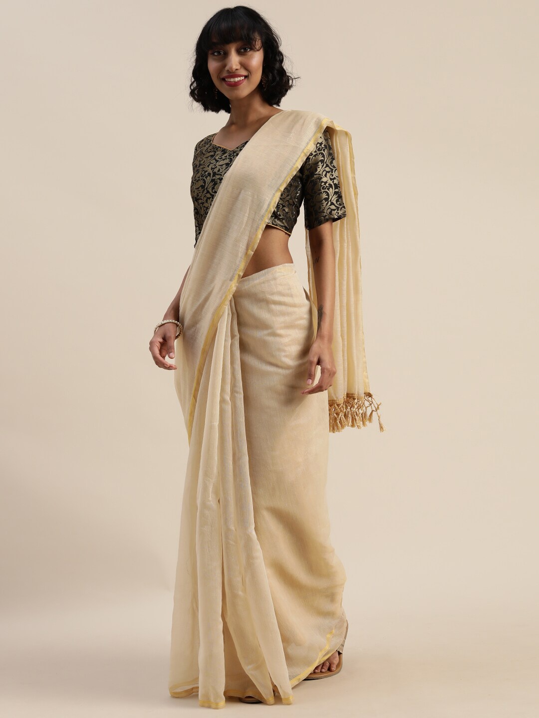 

Florence Cream-Coloured & Gold-Toned Art Silk Saree