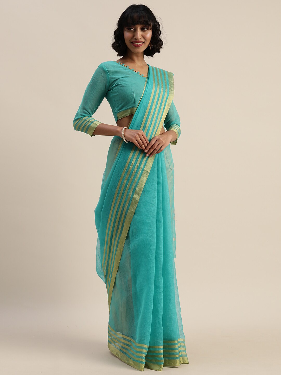 

Florence Sea Green & Goldeb Pure Cotton Saree With Zari Border