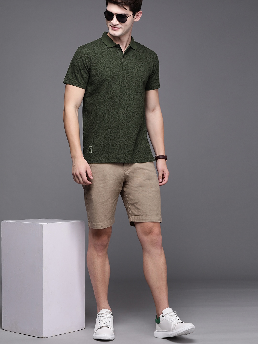 

Allen Solly Men Olive Green & Black Printed Polo Collar T-shirt