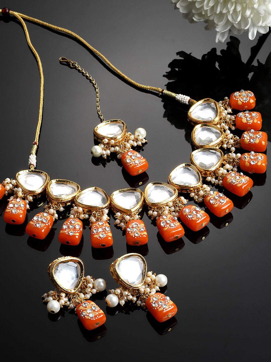 

KARATCART Gold-Plated Orange & White Polki Kundan-Studded & Pearl Beaded Jewellery Set