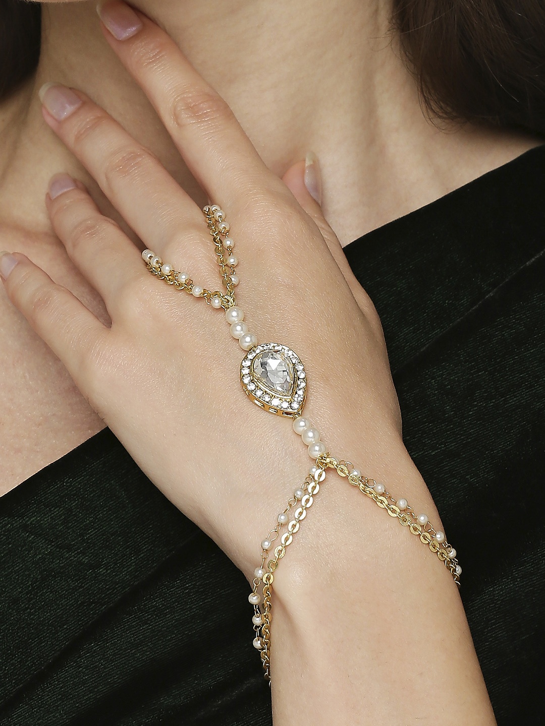 

OOMPH Women Gold-Toned & White Kundan & Pearls Hathphool Bracelet with Ring