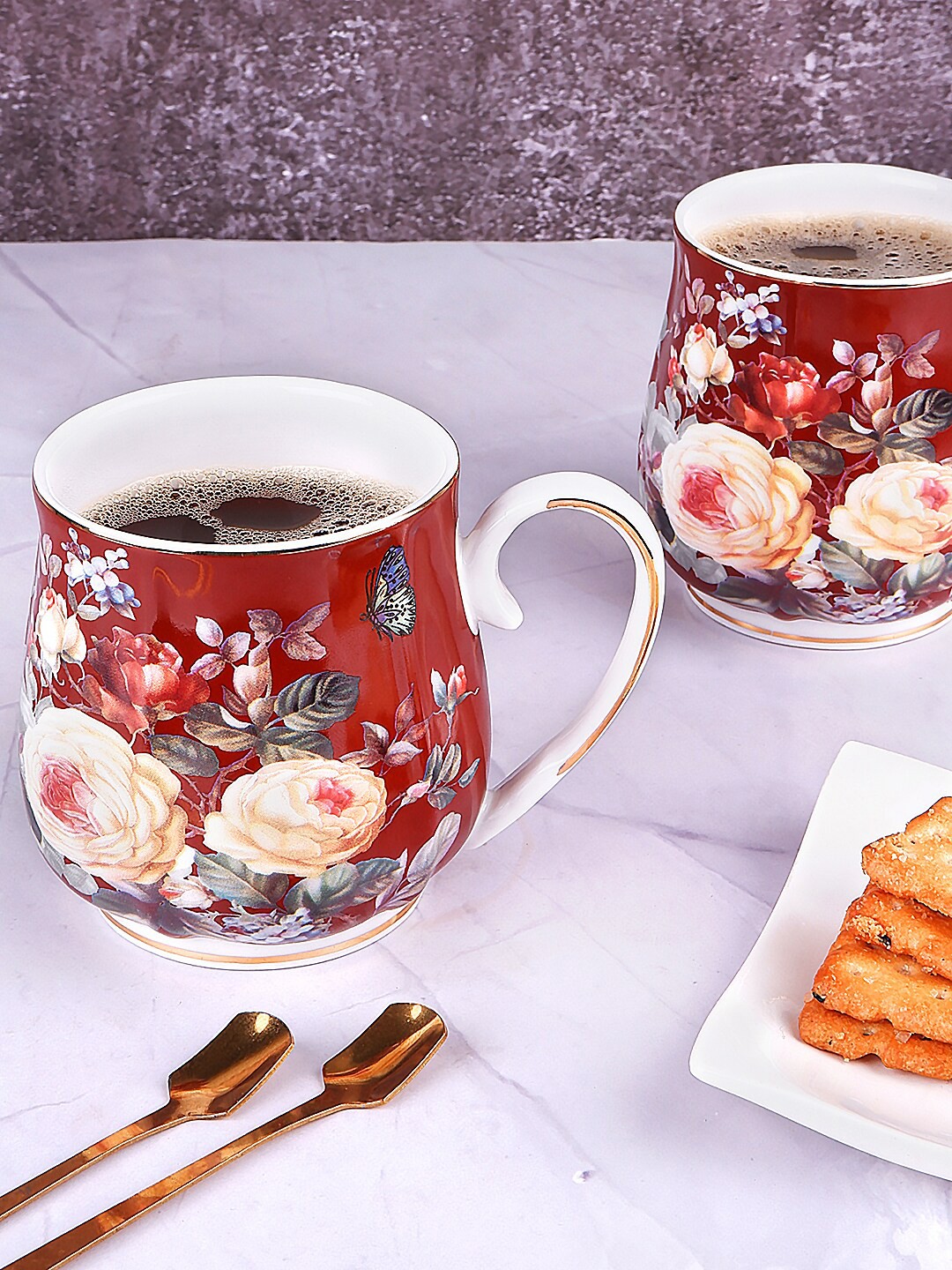 

THE WHITE INK DECOR Maroon Set of 2 Floral Printed Ceramic Glossy Mugs