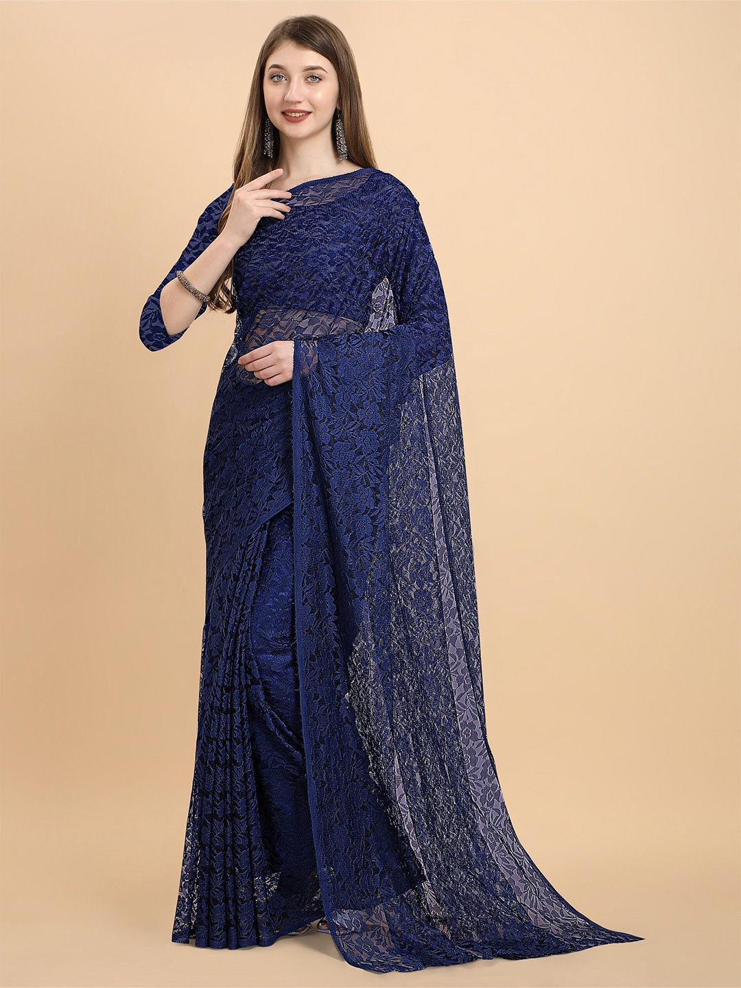

Iris Women Navy Blue Floral Embellished Rusell Net Saree
