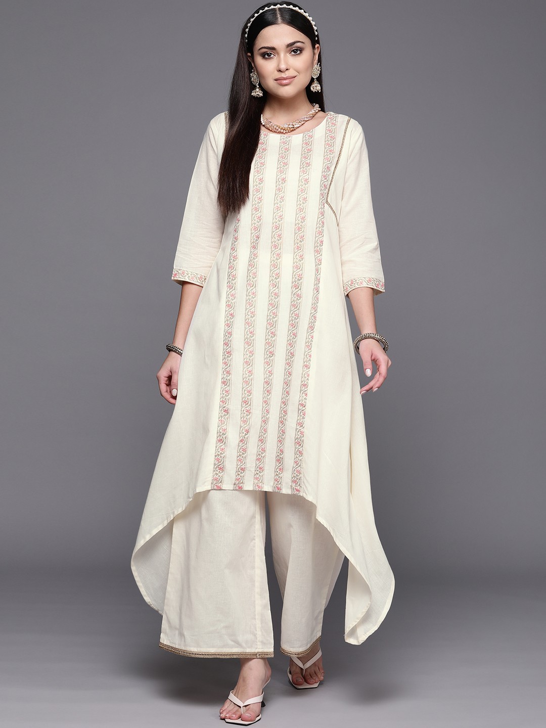

Ahalyaa Women Off White Floral Printed Panelled Cotton Kurta with Palazzos