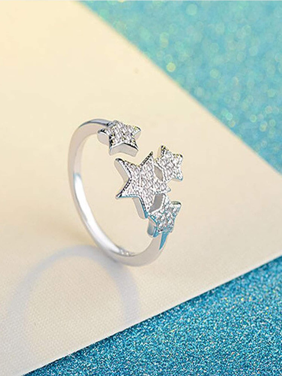 

Jewels Galaxy Silver-Plated White Stone-Studded Adjustable Finger Ring