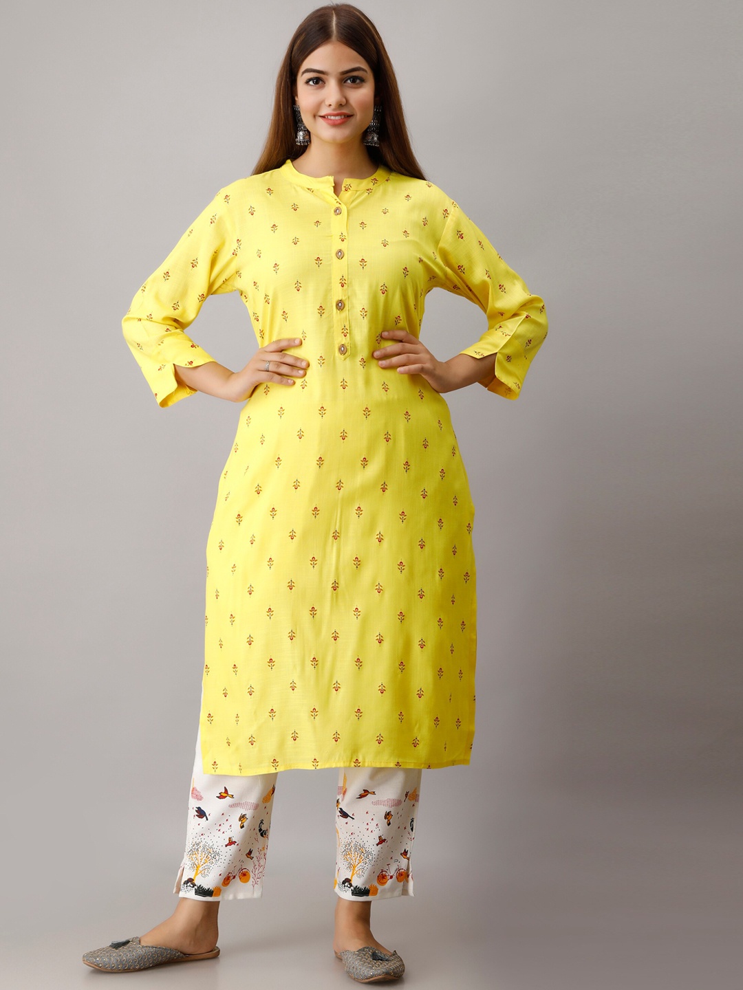 

OMASK Women Yellow Ethnic Motifs Printed Kurta with Trousers