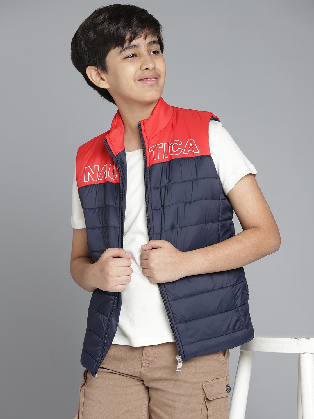 

Nautica Boys Navy Blue & Red Colourblocked Mock Collar Sleeveless Padded Jacket