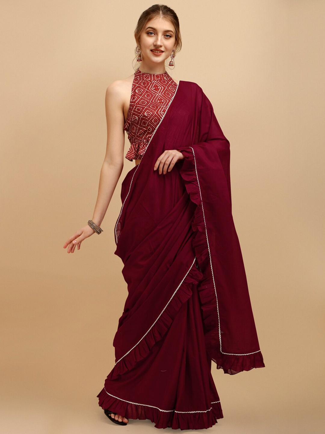 

Sangria Maroon Ruffled Saree