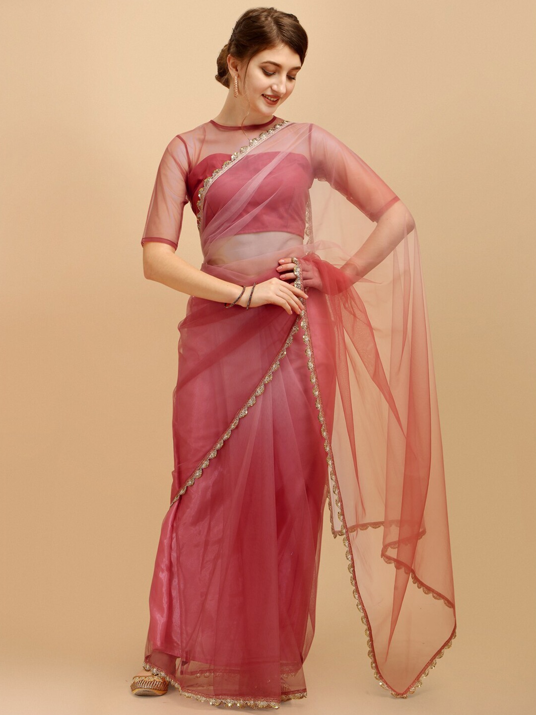 

Sangria Pink Net Saree With Embroidered Border & Blouse Piece