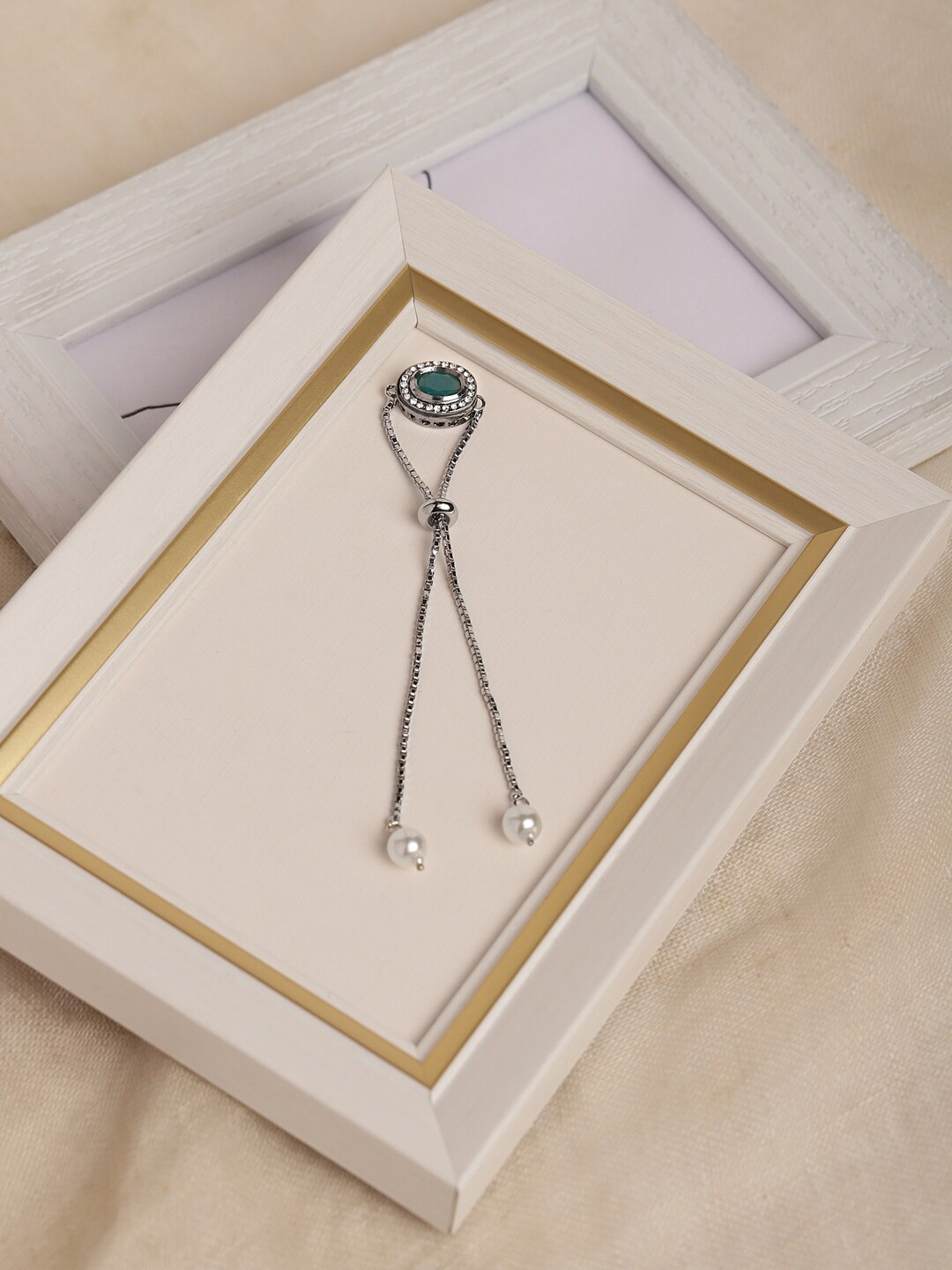 

Ruby Raang Women Green & Silver-Plated Brass Charm Bracelet