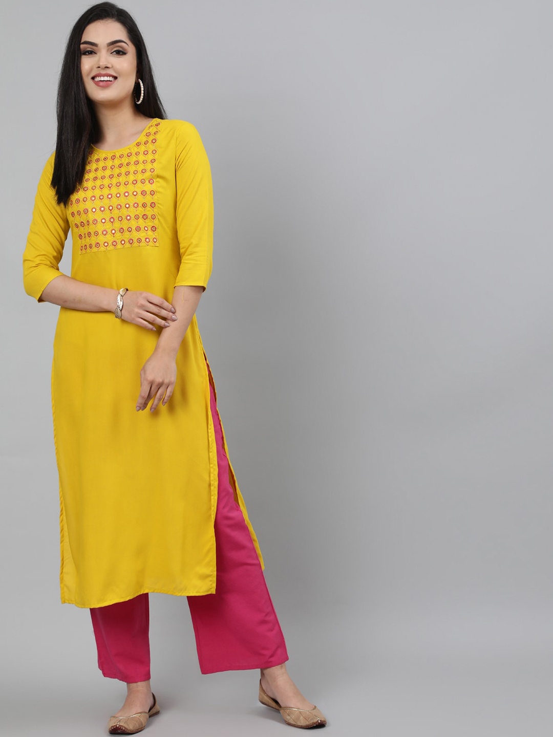 

KIMAYRA Women Mustard Yellow Ethnic Motifs Embroidered Mirror Work Kurta
