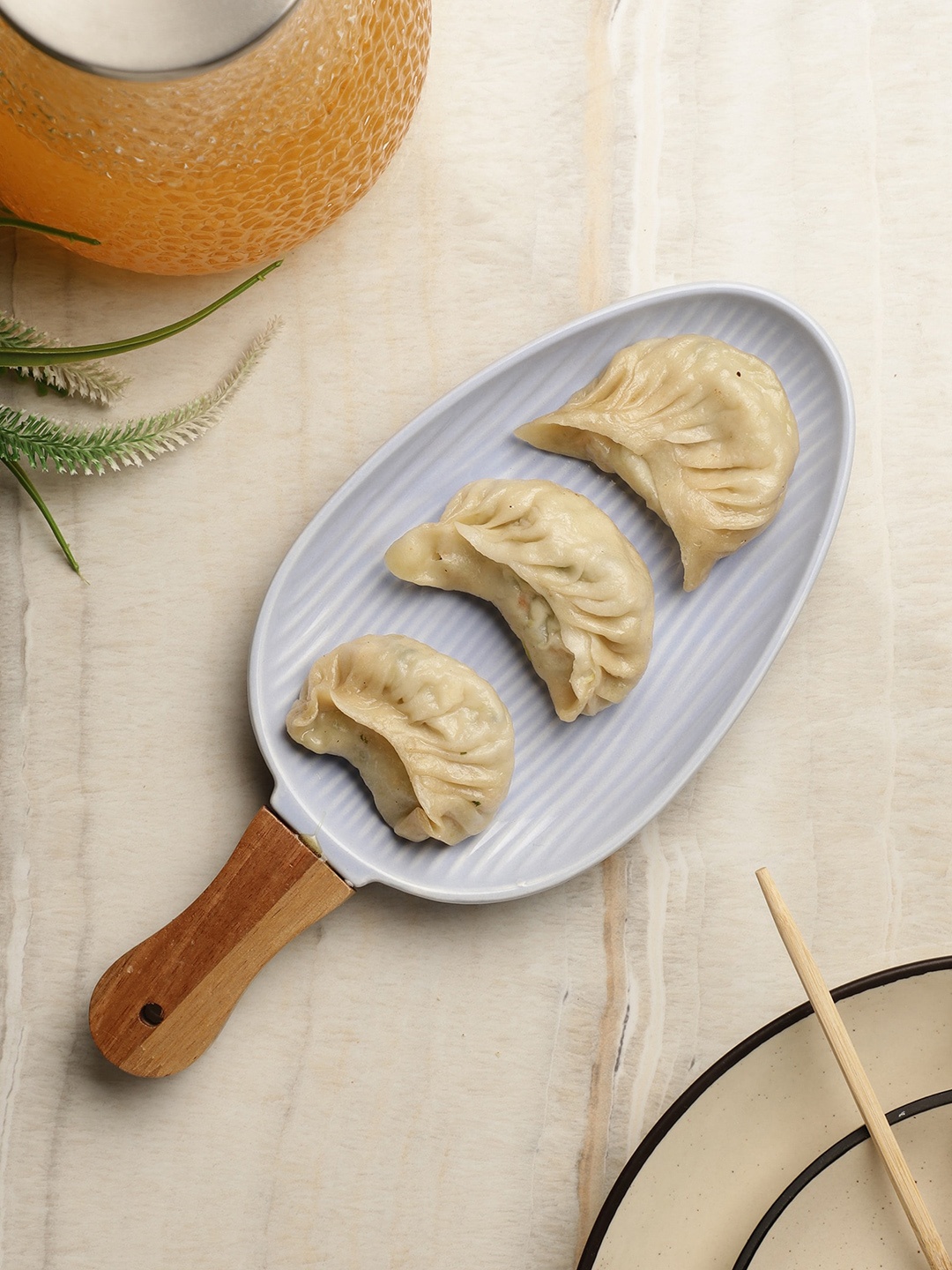 

The Decor Mart Blue & Brown Solid Ceramic Serving Platter With Wooden Handle