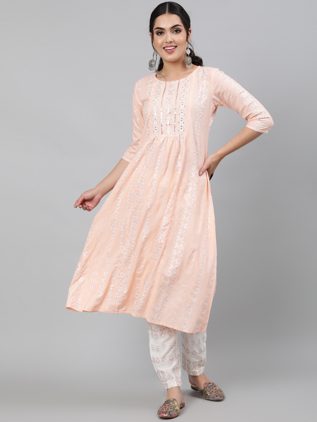 

KIMAYRA Women Peach-Coloured Embroidered Sequinned Kurti with Trousers
