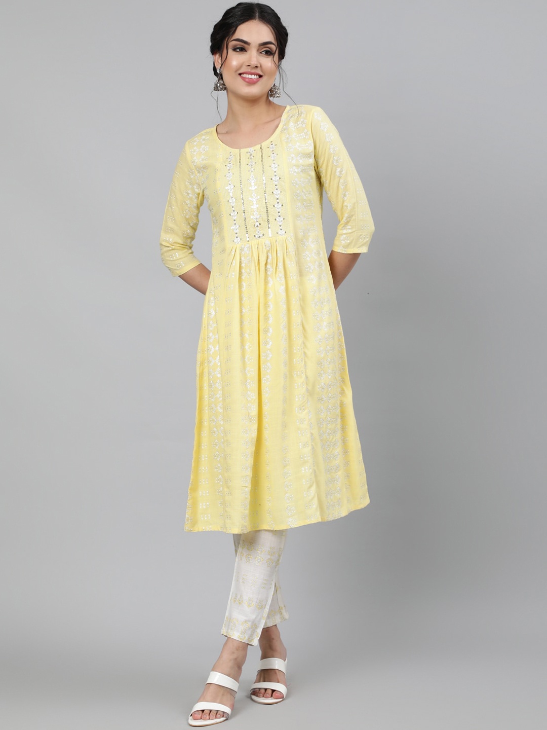 

KIMAYRA Women Yellow Floral Yoke Design Panelled Kurti with Trousers & With Dupatta