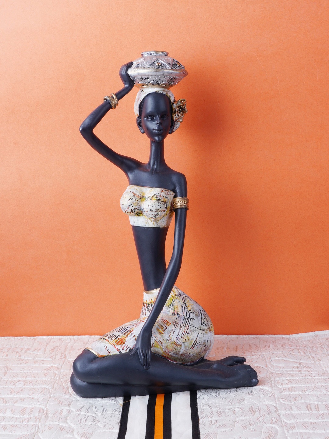 

FASHIYANOO Black & Gold-Toned Sitting Doll With Matka On Head Showpiece