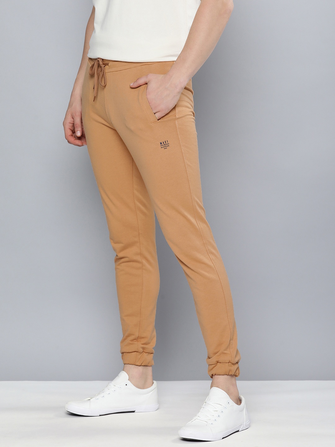 

Mast & Harbour Men Peach Coloured Solid Joggers