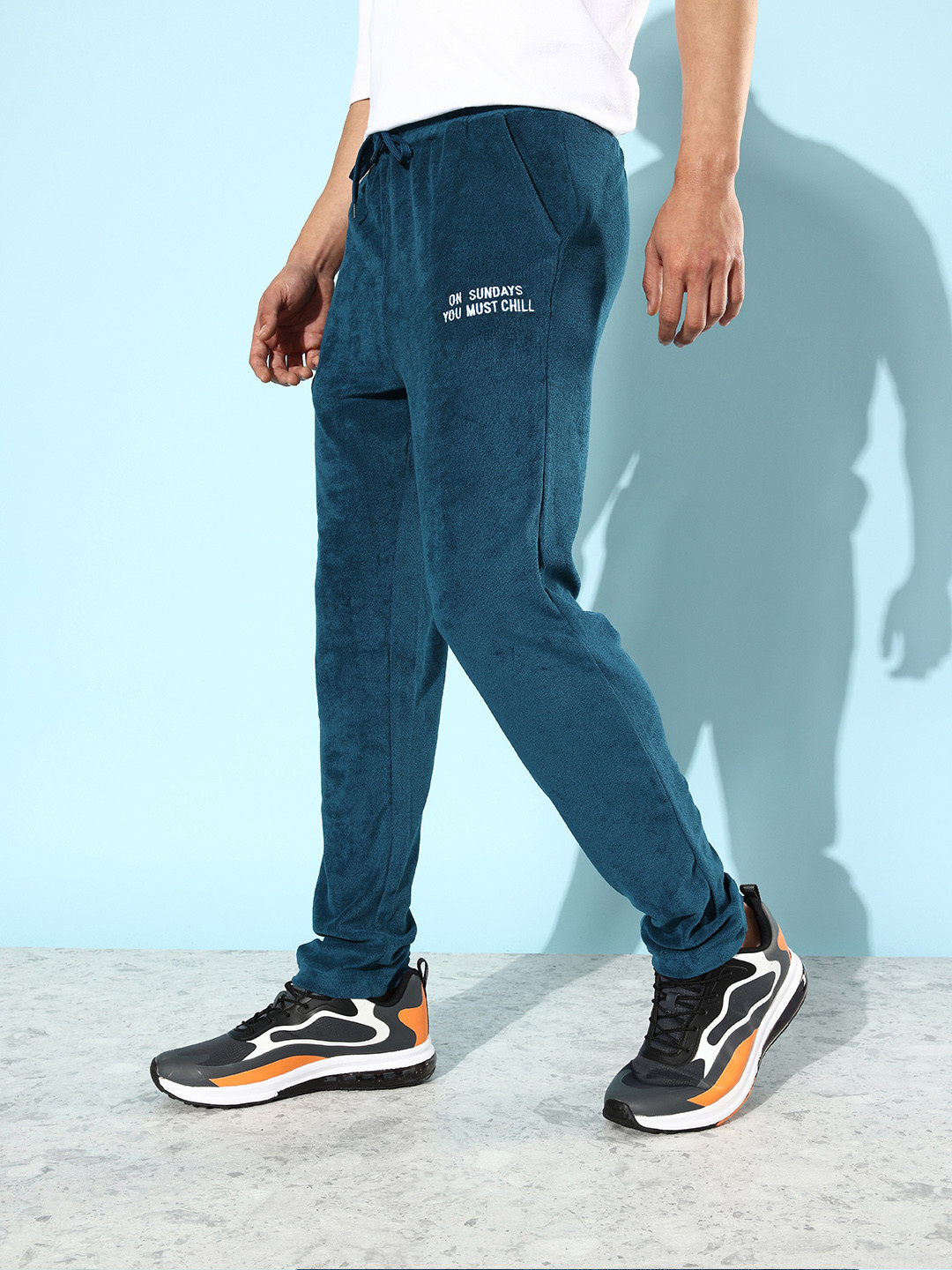 

Mast & Harbour Men Mid Rise Solid Terry Track Pants, Blue