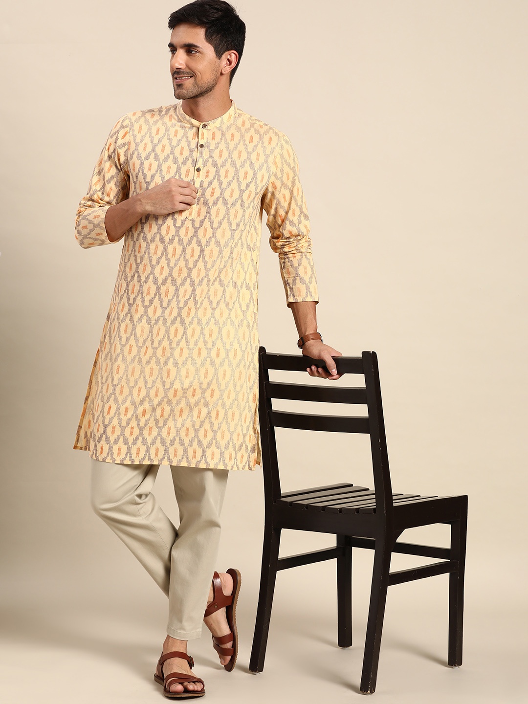 

Anouk Men Beige Pure Cotton Ikkat Inspired Print Kurta