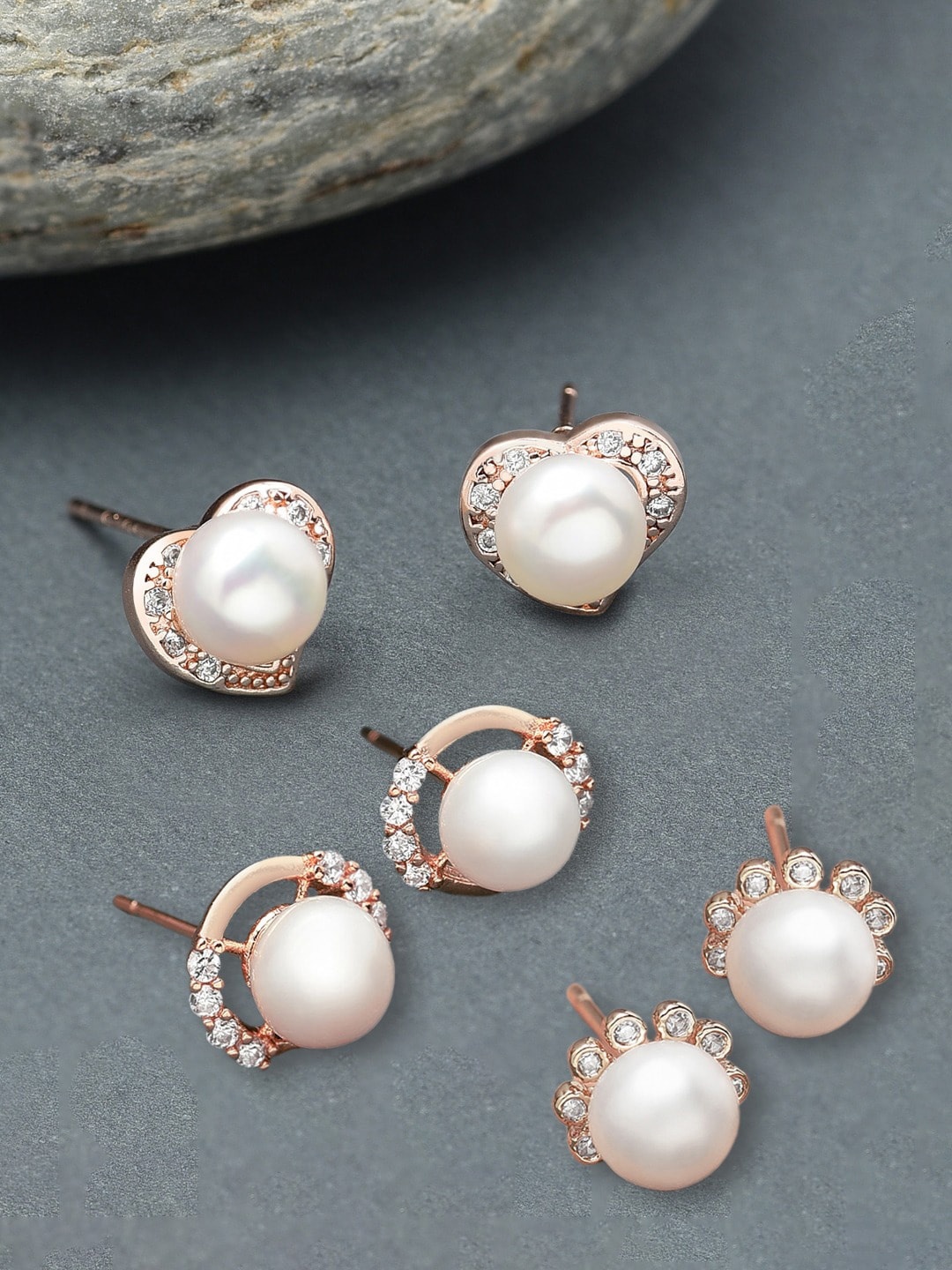 

Zaveri Pearls Rose Gold Contemporary Studs Earrings