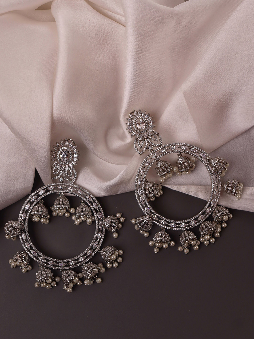 

CURIO COTTAGE Silver-Toned Classic Jhumkas Earrings