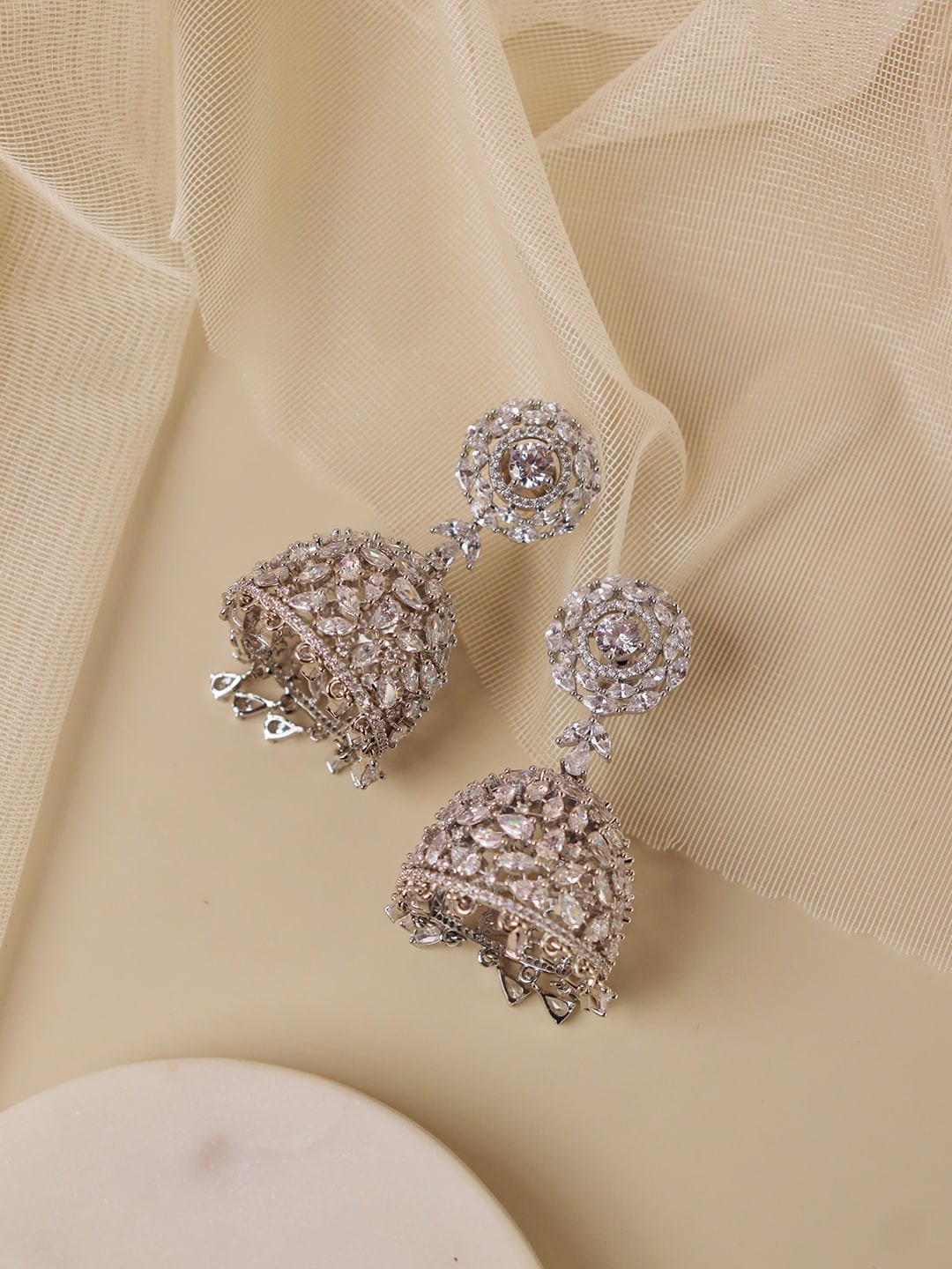 

CURIO COTTAGE Silver-Toned Contemporary Jhumkas Earrings