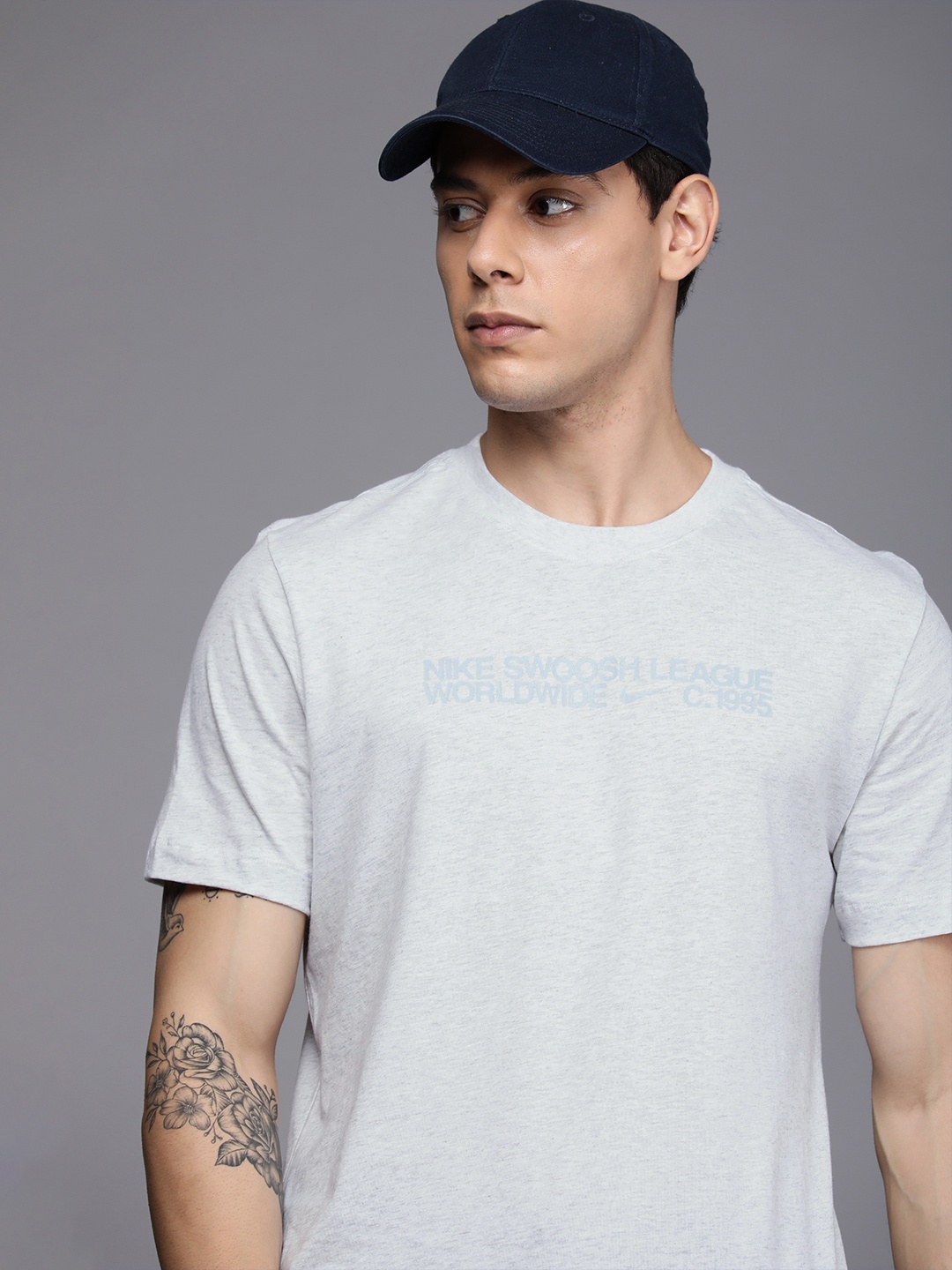 

Nike Men Grey & Blue Brand Logo Printed Pure Cotton T-shirt