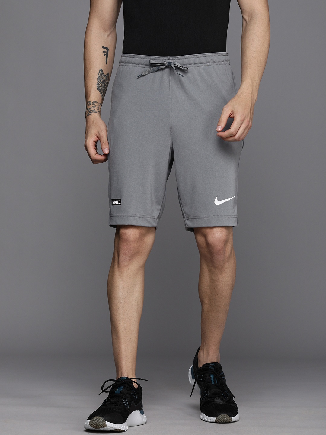 

Nike Men Grey Solid Mid-Rise Sports Shorts With Brand Logo Detail