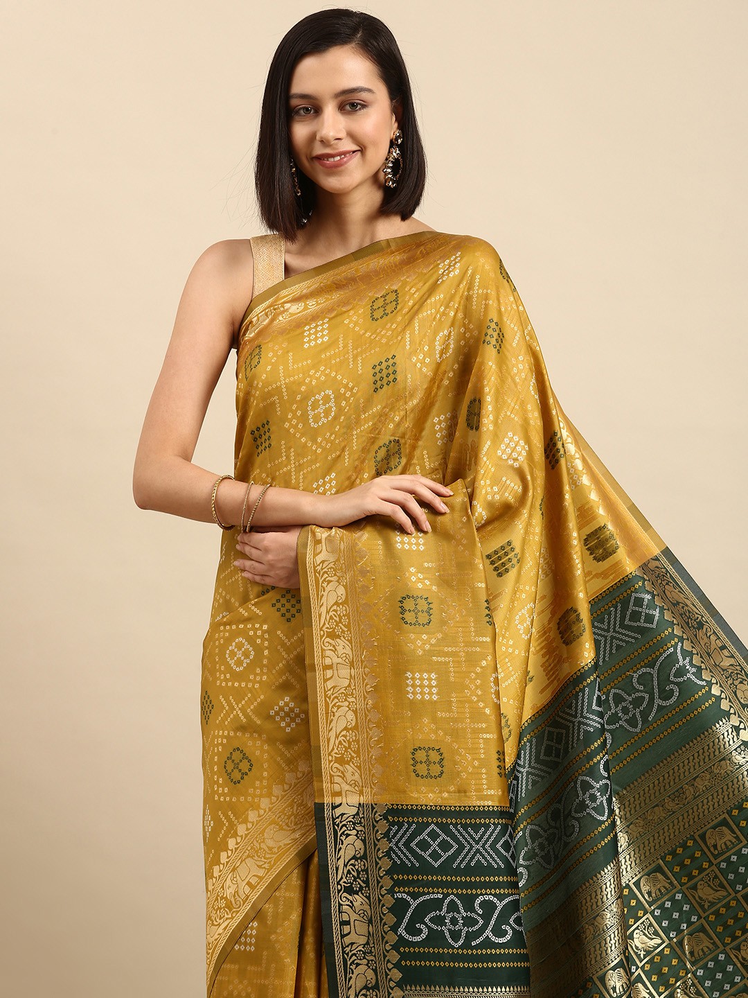 

Anouk Mustard Yellow & Green Ethnic Motifs Saree