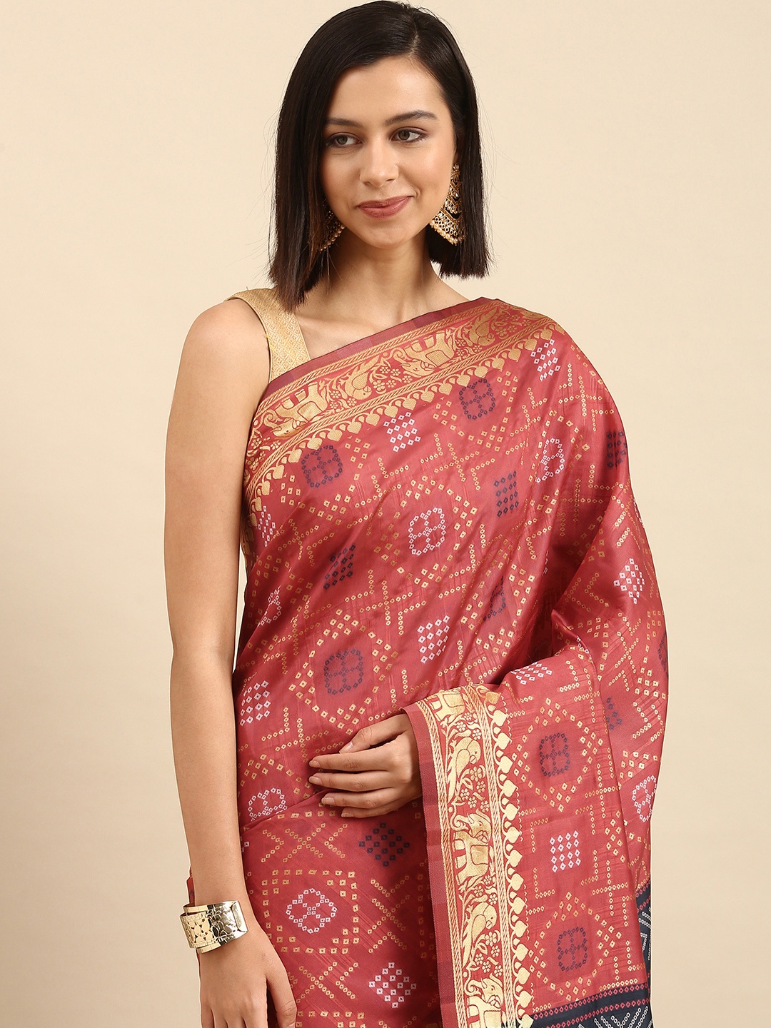

Anouk Pink & Navy Blue Ethnic Motifs Saree