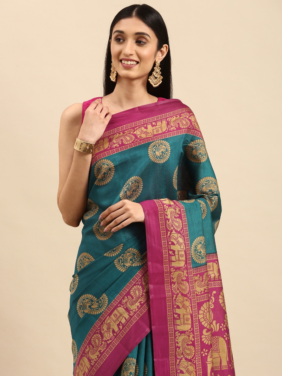 

Anouk Teal Blue & Fuchsia Ethnic Motifs Art Silk Banarasi Saree