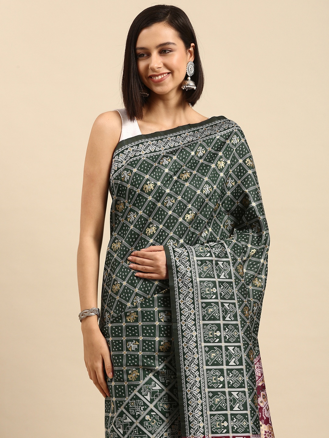

Anouk Green & White Ethnic Motifs Silk Blend Saree