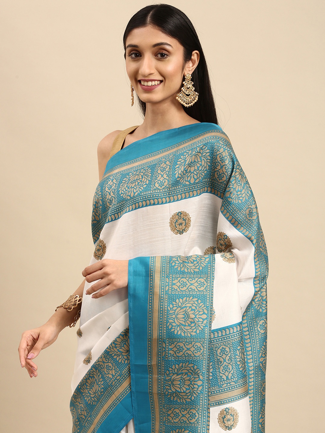 

Anouk White & Turquoise Blue Ethnic Motifs Art Silk Banarasi Saree