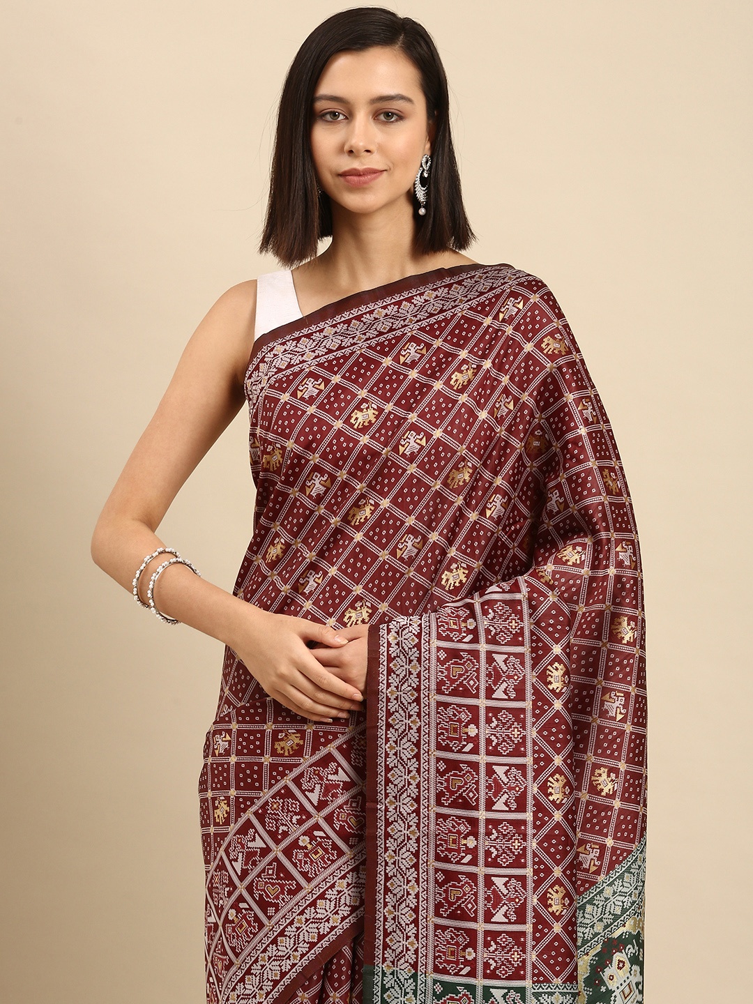 

Anouk Maroon & White Ethnic Motifs Silk Blend Saree