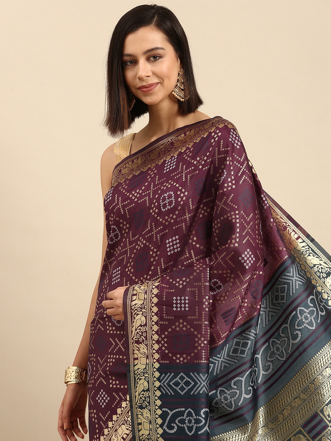 

Anouk Burgundy & Golden Ethnic Motifs Silk Blend Saree