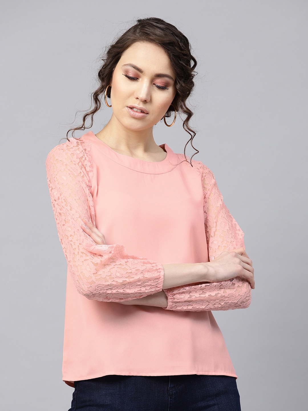 

SASSAFRAS Women Peach-Coloured Solid Styled Back Top
