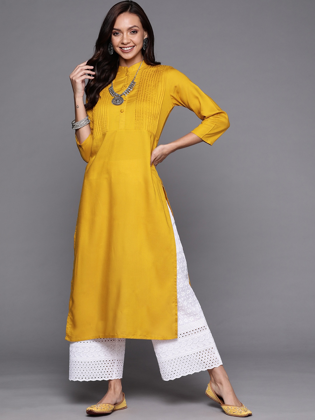 

Libas Women Mustard Yellow Solid Straight Kurta