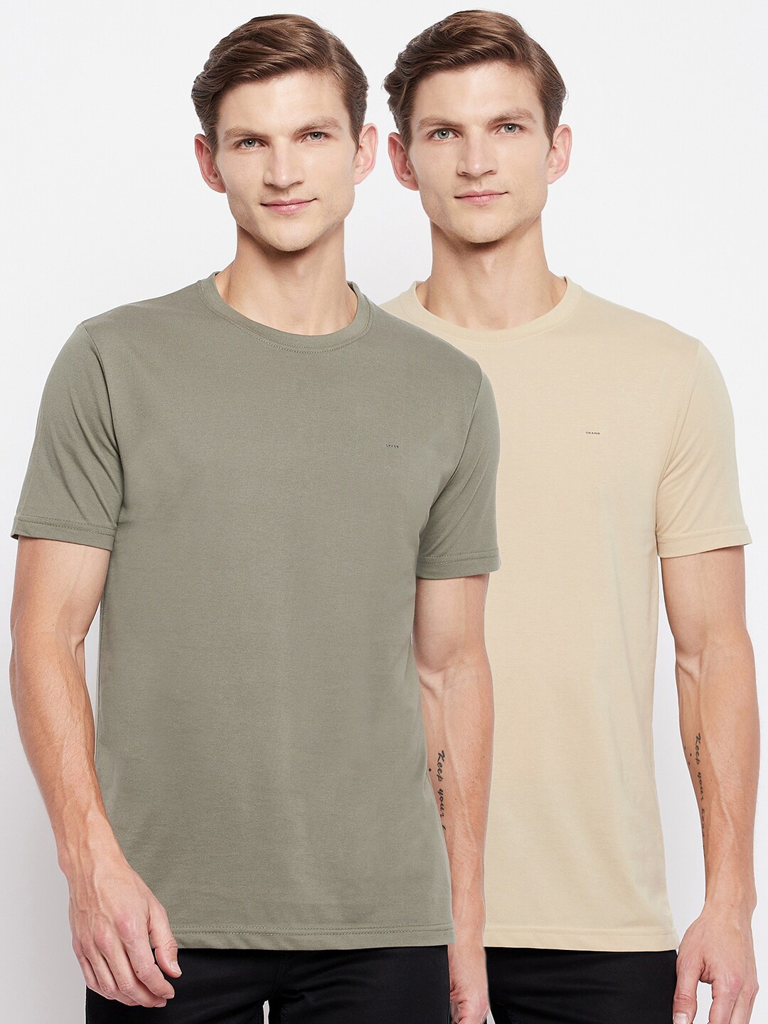

Okane Men Olive Green & Cream Solid Round Neck T-shirt Pack Of 2