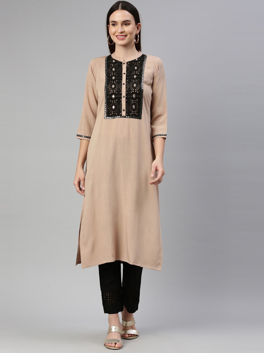 

Neerus Women Beige & Black Embroidered Mirror Work Kurta