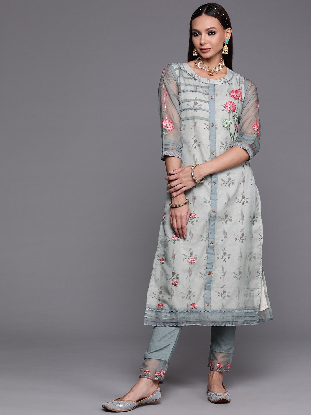

Indo Era Women Turquoise Blue Floral Embroidered Kurta with Trousers