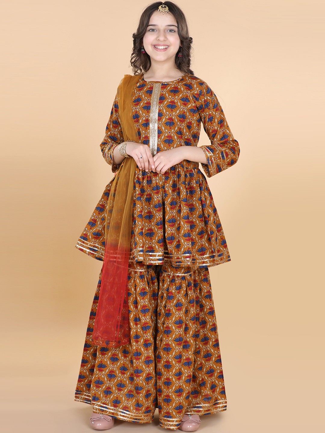 

ADIVA Girls Mustard Yellow Ethnic Motifs Printed Cotton Kurta with Sharara & Dupatta