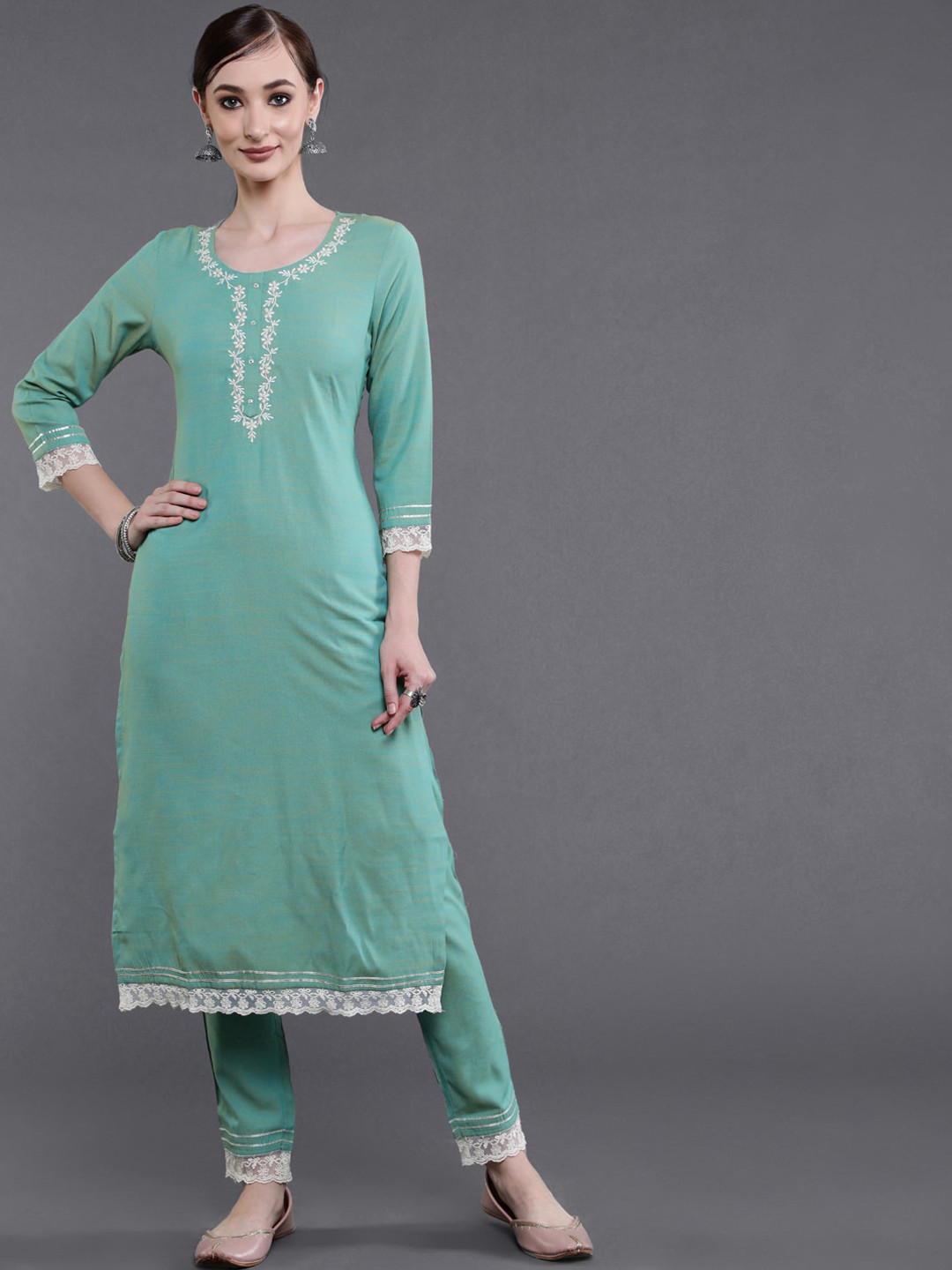 

saubhagya Women Sea Green Floral Embroidered Kurta with Trousers