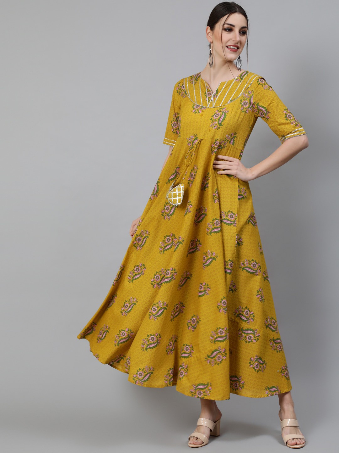 

Awadhi Women Yellow Ethnic Motifs Printed Keyhole Neck Maxi Dress
