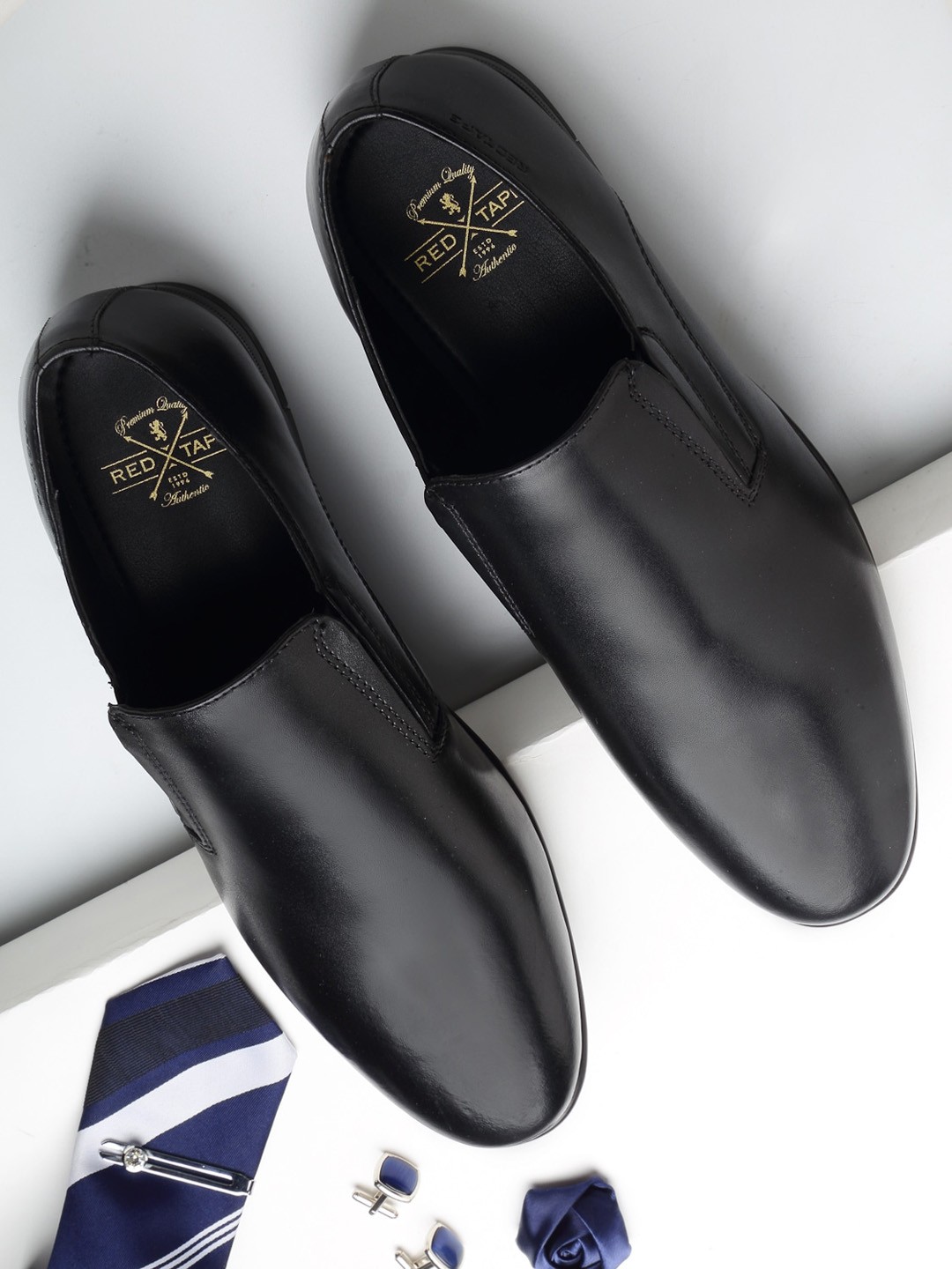 

Red Tape Men Black Solid Slip-on Formal Shoes