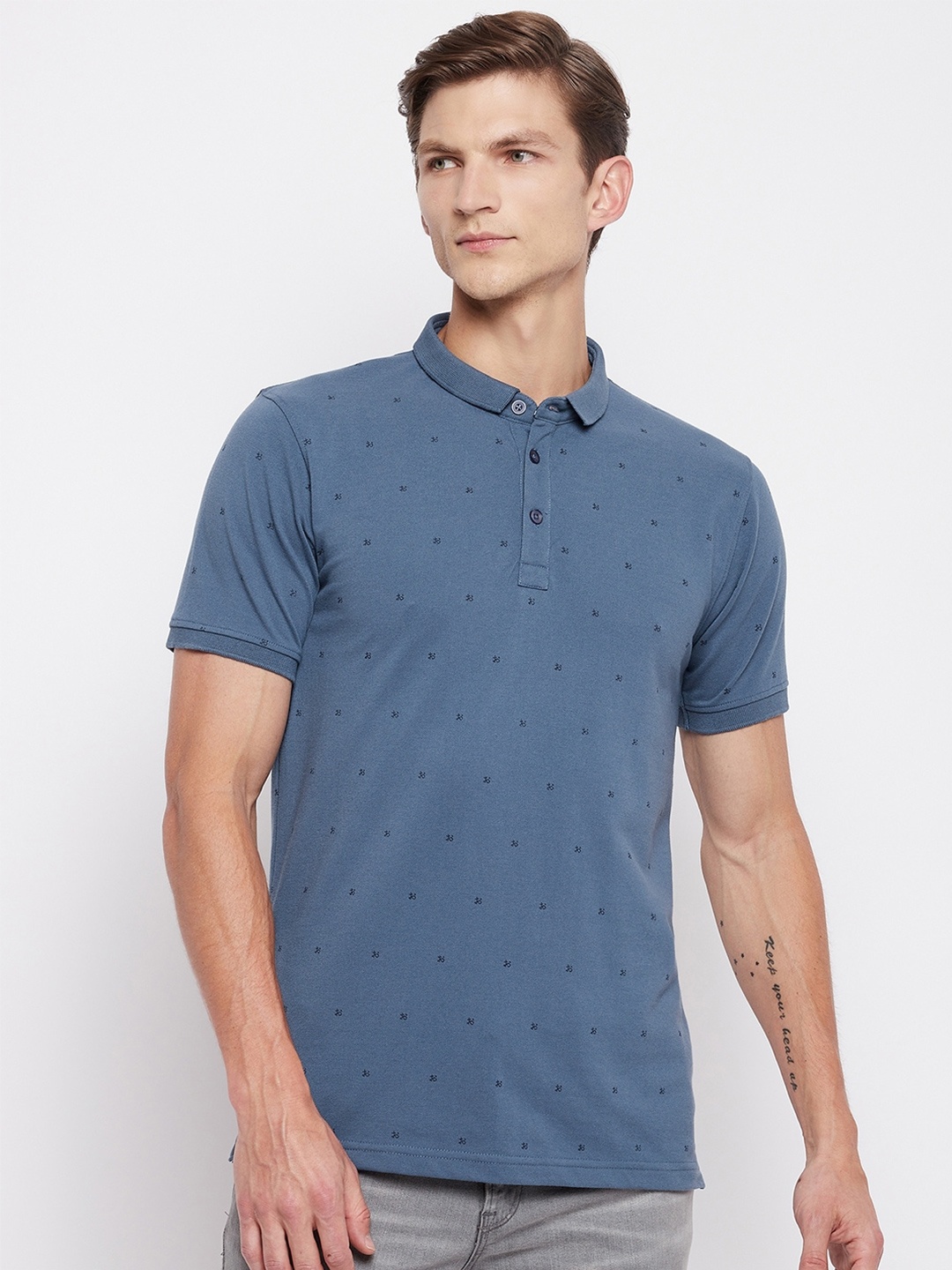 

Okane Men Blue Printed Polo Collar T-shirt